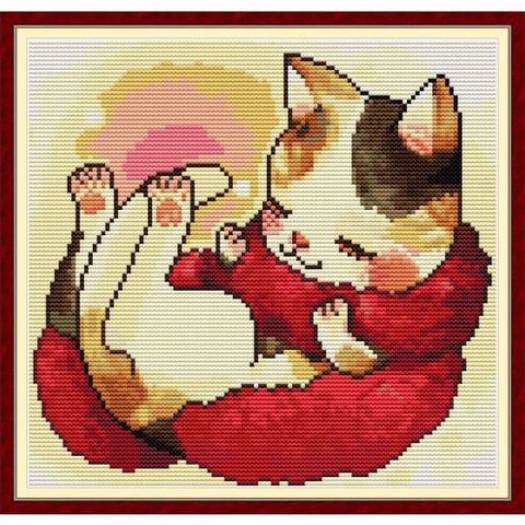 A cat with a red scarf