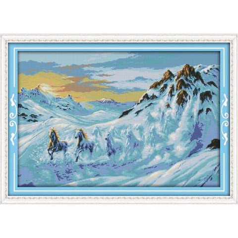 Horses running in the snow mountain