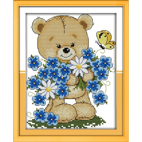 Little bear with flowers