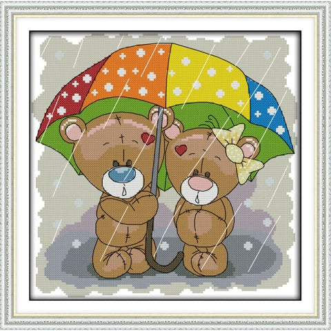 The bear couple hold up an umbrella