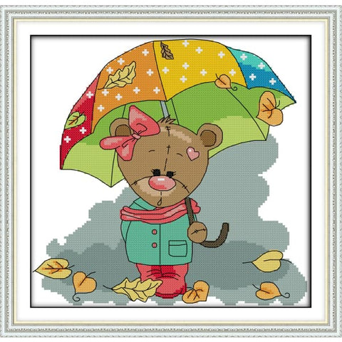 The bear hold up an umbrella