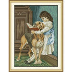 The girl and her dog reading a book together