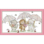 The three little kittens under the umbrella