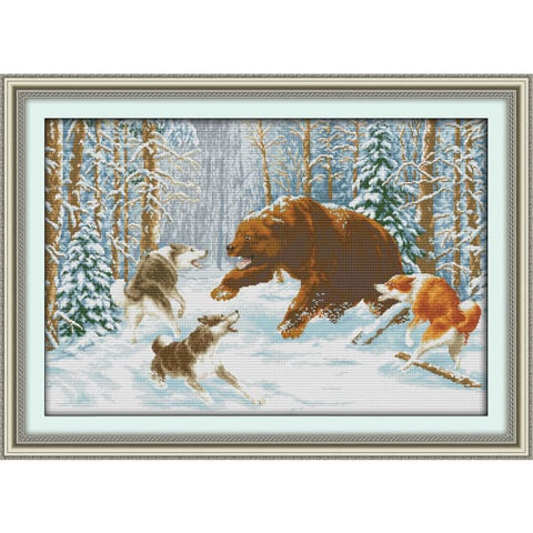 Wolves and bear in the snow